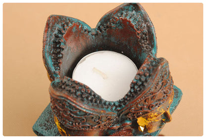 ANTIQUE BUDDHA TEALIGHT HOLDER--POLYRESIN